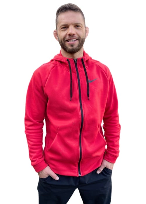trainer in red sweatshirt